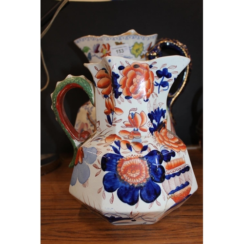 153 - Masons jug, another similar, and a Staffordshire pottery flatback of The Three Graces.