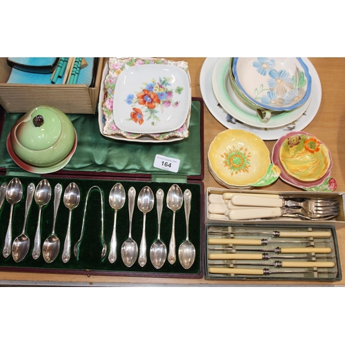 164 - Ceramics to include Carlton ware, condiments, dishes, a Wedgwood sugar canister, and silver-plated f... 