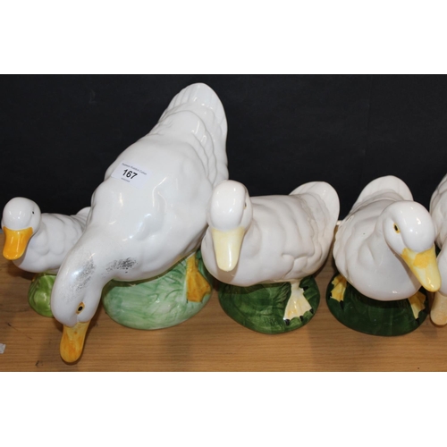 167 - Eight pottery duck models.