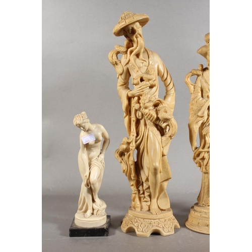 83 - Four resin style figures.