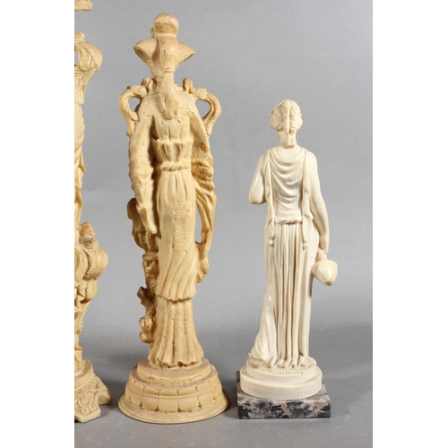 83 - Four resin style figures.