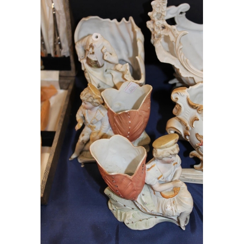 87 - Staffordshire flatback spill vase, a pottery basket with figural decoration, and other figure groups... 