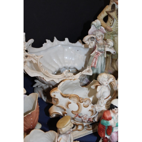 87 - Staffordshire flatback spill vase, a pottery basket with figural decoration, and other figure groups... 