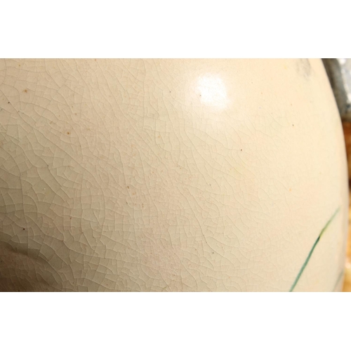 92 - Pottery vase depicting a boy in vintage dress.