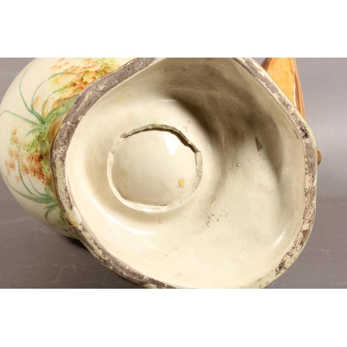 92 - Pottery vase depicting a boy in vintage dress.