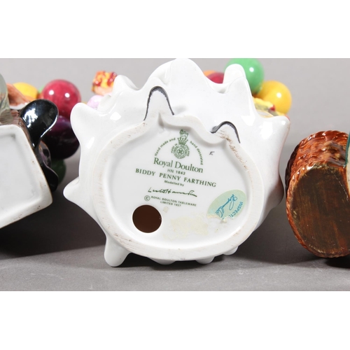 94 - Royal Doulton figures HN1315 The Old Balloon Seller, HN1843 Biddy Penny Farthing, and HN1954 The Bal... 