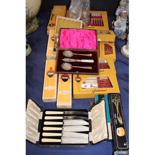 96 - Inca of Norway flatware, a cased set of knives, a cake topper, etc.