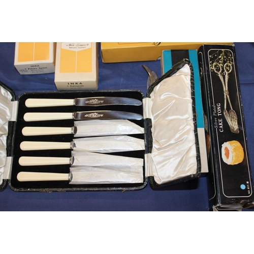 96 - Inca of Norway flatware, a cased set of knives, a cake topper, etc.