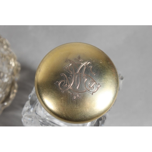174 - Victorian cut-glass scent bottle with silver gilt cover, 13cm high, and another of globular form wit... 