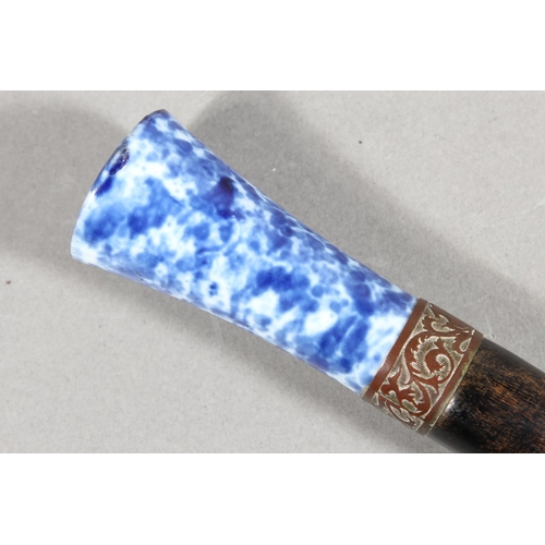 193 - Chinese style paper knife with mottled blue and white porcelain handle, 36cm long.