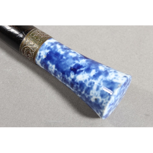 193 - Chinese style paper knife with mottled blue and white porcelain handle, 36cm long.