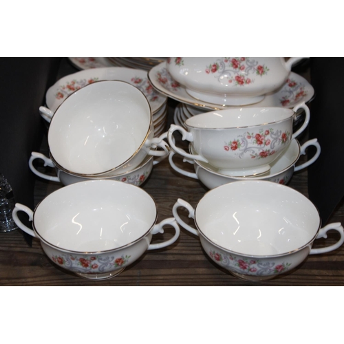 195 - Bone china Gainsborough part dinner set with twin-handled soup bowls.