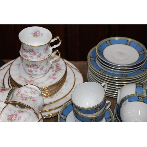 199 - Paragon Victoriana Rose part teaset and a Czechoslovakia Victoria china teaset.