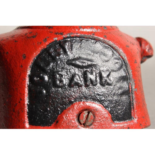 203 - Cast metal mechanical Jolly money bank.