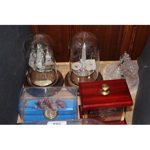 204 - Ships in bottles to include a model of a four-masted Barquentine by A Wilson, 1973, a Santa Maria, e... 