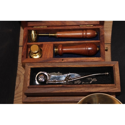 211 - Pair of WWI era binoculars, an Agfa boxed camera, a boxed bosun's whistle, a cased maritime seal set... 