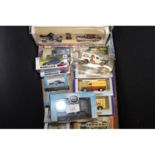 223 - Twenty-one boxed die-cast models to include Oxford, Lledo, Feisu, etc., each boxed.&nbsp;
