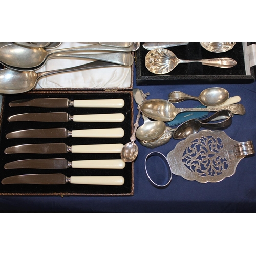 124 - Silver-plate to include flatware, spoons, a christening spoon, etc.