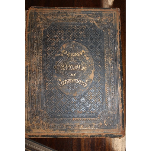 301C - Leather bound Bible and another leather bound.