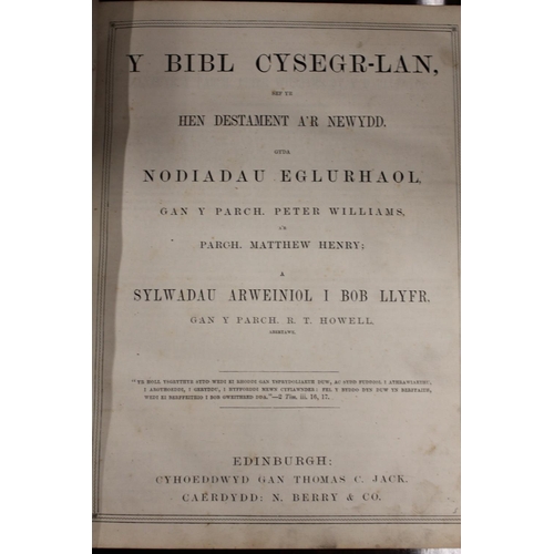 301C - Leather bound Bible and another leather bound.