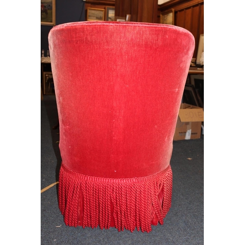 557C - Red upholstered bedroom chair.