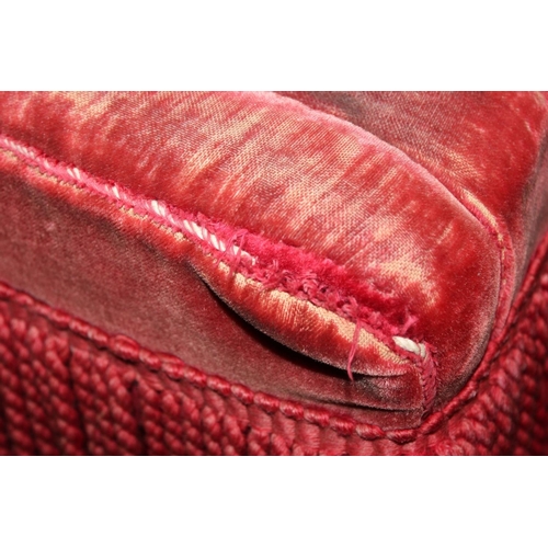 557C - Red upholstered bedroom chair.