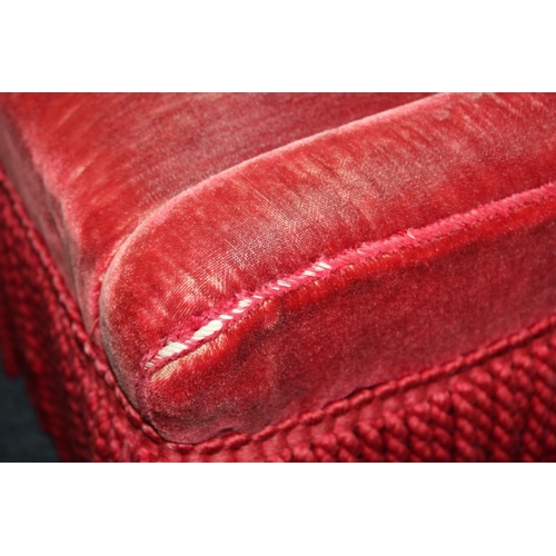 557C - Red upholstered bedroom chair.