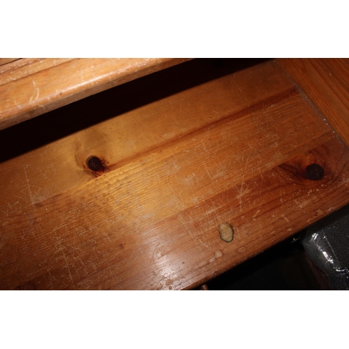 562 - Pine roll top desk.