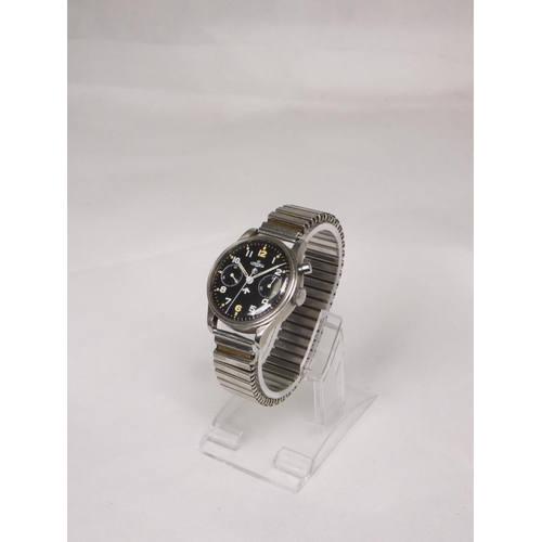 91 - Lemania. A Royal Navy military issue monopusher chronograph wristwatch, having black dial with lumin... 
