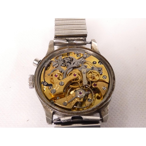 91 - Lemania. A Royal Navy military issue monopusher chronograph wristwatch, having black dial with lumin... 