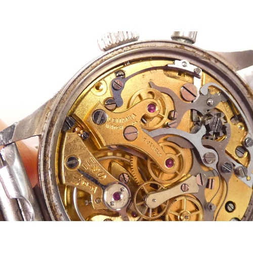 91 - Lemania. A Royal Navy military issue monopusher chronograph wristwatch, having black dial with lumin... 