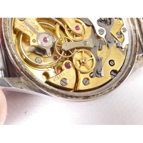 91 - Lemania. A Royal Navy military issue monopusher chronograph wristwatch, having black dial with lumin... 