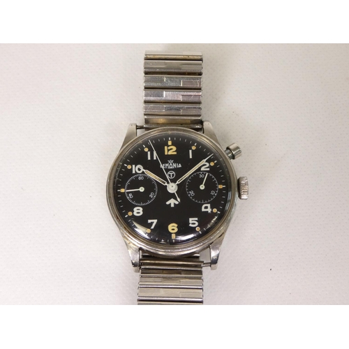 91 - Lemania. A Royal Navy military issue monopusher chronograph wristwatch, having black dial with lumin... 