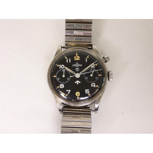 91 - Lemania. A Royal Navy military issue monopusher chronograph wristwatch, having black dial with lumin... 