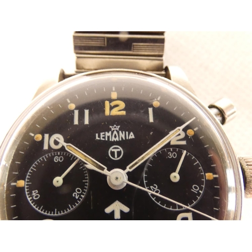 91 - Lemania. A Royal Navy military issue monopusher chronograph wristwatch, having black dial with lumin... 