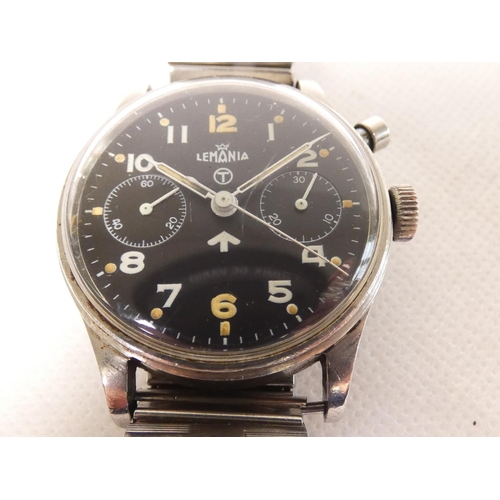 91 - Lemania. A Royal Navy military issue monopusher chronograph wristwatch, having black dial with lumin... 