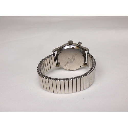 91 - Lemania. A Royal Navy military issue monopusher chronograph wristwatch, having black dial with lumin... 