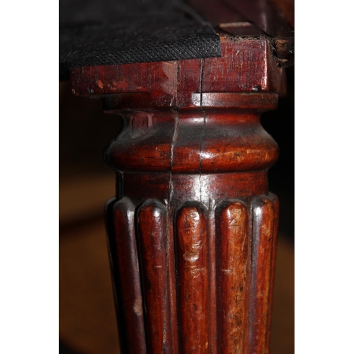 545 - Antique mahogany armchair, raised on fluted supports with brass castors.