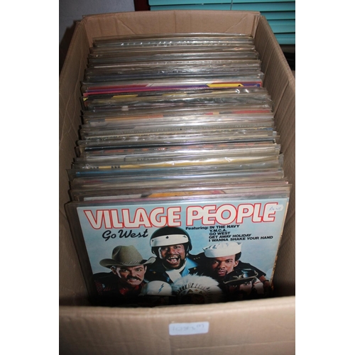 Two boxes containing a large collection of vinyl records, etc.