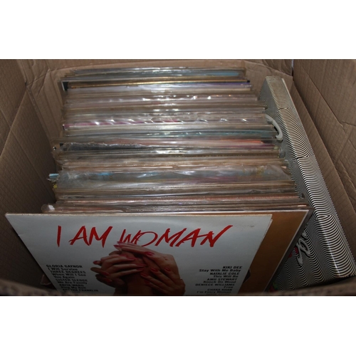 Two boxes containing a large collection of vinyl records, etc.