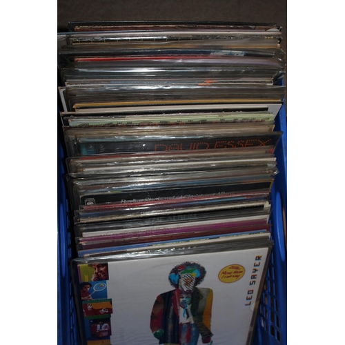 Boxed crate containing mixed vinyl records and a box containing boxsets.