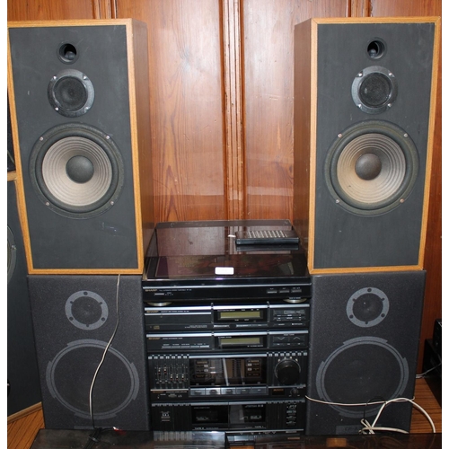 Sharp sound system with turntable, compact disc, amplifier, etc and a ...