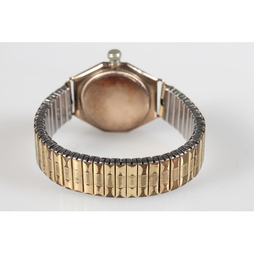 195 - Rolex Oyster Gents wristwatch with 9ct gold case on flex strap, the champagne dial with Arabic numer... 
