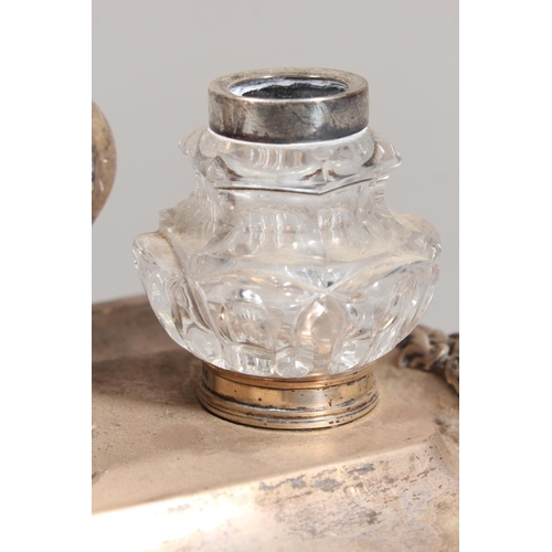 25 - William IV silver desk stand with twin glass inkwells raised on scrolling feet, Charles Reily & ... 