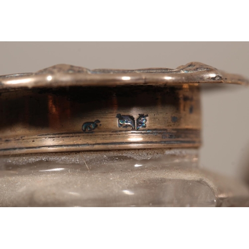 25 - William IV silver desk stand with twin glass inkwells raised on scrolling feet, Charles Reily & ... 