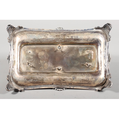 25 - William IV silver desk stand with twin glass inkwells raised on scrolling feet, Charles Reily & ... 