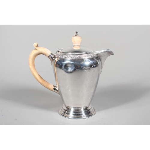 27 - Four piece silver tea service on matching tray, with Lindisfarne border decoration and stamp to base... 
