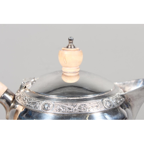 27 - Four piece silver tea service on matching tray, with Lindisfarne border decoration and stamp to base... 