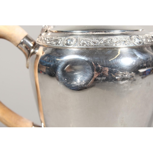 27 - Four piece silver tea service on matching tray, with Lindisfarne border decoration and stamp to base... 