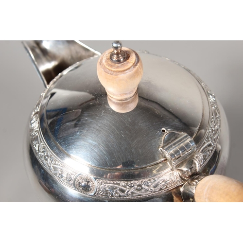 27 - Four piece silver tea service on matching tray, with Lindisfarne border decoration and stamp to base... 